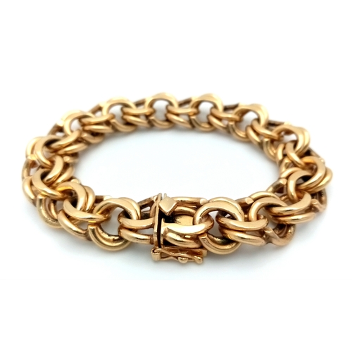 51 - A SUPERB DOUBLE FANCY LINK BRACELET IN 14K GOLD WITH SAFETY CATCH IN AS NEW CONDITION . A SERIOUSLY ... 