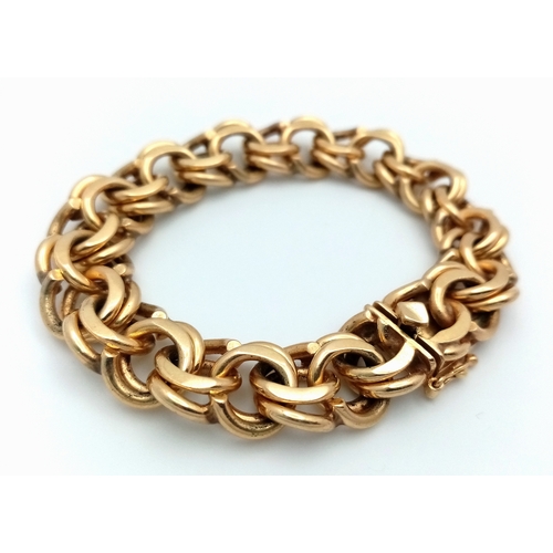 51 - A SUPERB DOUBLE FANCY LINK BRACELET IN 14K GOLD WITH SAFETY CATCH IN AS NEW CONDITION . A SERIOUSLY ... 