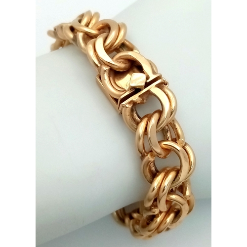 51 - A SUPERB DOUBLE FANCY LINK BRACELET IN 14K GOLD WITH SAFETY CATCH IN AS NEW CONDITION . A SERIOUSLY ... 