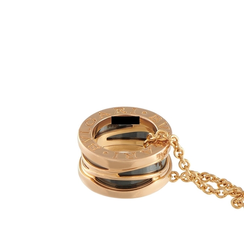 14 - A Bvlgari Legend 18K Rose Gold Ceramic Necklace. The luxury brands signature engraved at each end of... 
