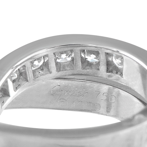 35 - A Cartier Nouvelle Vague 18K White Gold 1.20ct Diamond Ring, dynamic crossover design. Inset Diamond... 