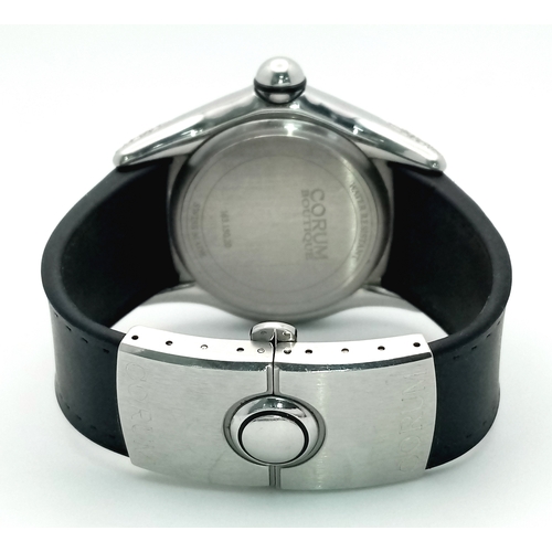 67 - A Corum Bubble, Diamond Gents Watch. Model 163.150.20. 
Black leather and rubber strap - With a Coru... 