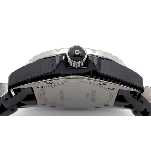74 - A Chanel J12 Diamond Automatic Ladies Watch. Model D.X. 14136. Black ceramic bracelet and case - 33m... 