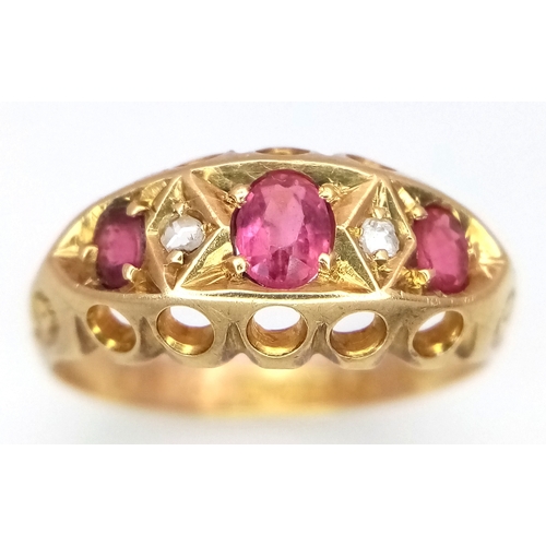 110 - AN 18K YELLOW GOLD ANTIQUE DIAMOND AND RUBY RING. 3G. SIZE L. HALLMARKED BIRMINGHAM 1918. SC6080.