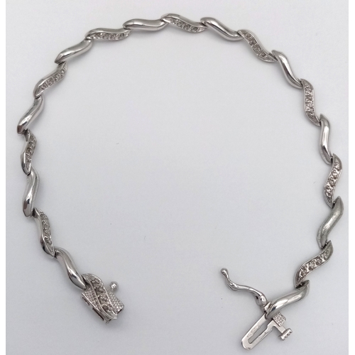 112 - Beautiful  DIAMOND SET 9 CARAT  WHITE GOLD ‘TENNIS BRACELET’. 5.9 Grams. 19 cm.