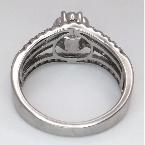 116 - 9K WHITE GOLD FANCY DIAMOND SET RING. APPROX 1CT DIAMONDS. 4.5G SIZE O. REF: TAN 6003