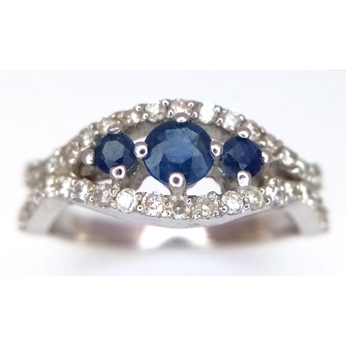 71 - 18K WHITE GOLD FANCY DIAMOND AND SAPPHIRE SET RING 3.7G SIZE N. REF: SPSA 6005