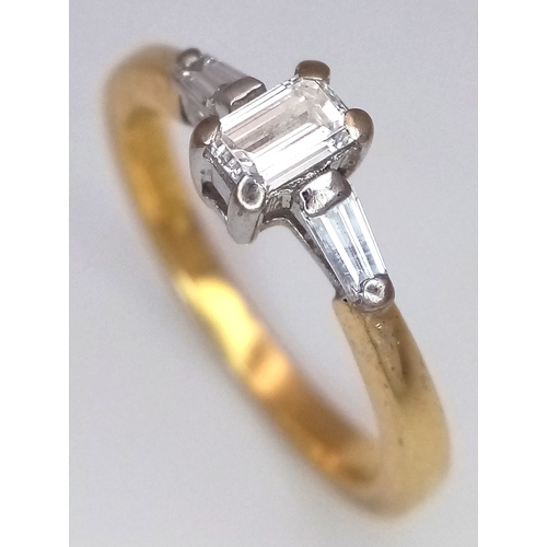 75 - AN 18K YELLOW GOLD 3 STONE DIAMOND RING - 0.30CTW. 2.9G. SIZE J. SC6059.