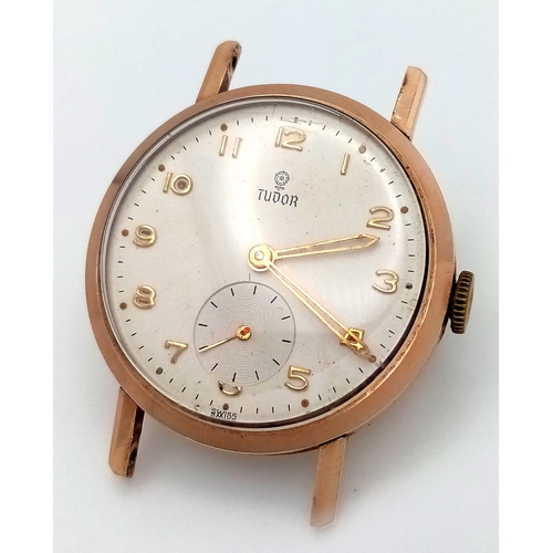 81 - A MID SIZE 9K GOLD TUDOR WATCH CASE     (NEEDS LUGS AND STRAP) MANUAL WIND AND GOOD WORKING ORDER.