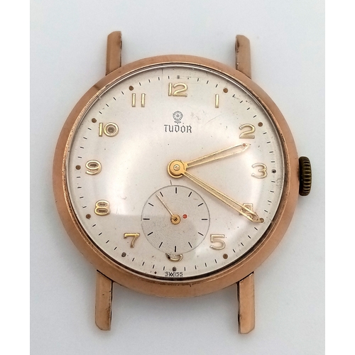 81 - A MID SIZE 9K GOLD TUDOR WATCH CASE     (NEEDS LUGS AND STRAP) MANUAL WIND AND GOOD WORKING ORDER.