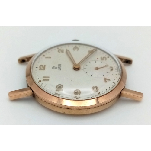 81 - A MID SIZE 9K GOLD TUDOR WATCH CASE     (NEEDS LUGS AND STRAP) MANUAL WIND AND GOOD WORKING ORDER.