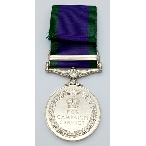 94 - A General Service Medal 1962 with clasp Dhofar, named to: 24068855 Sig A L Curle R Signals.
The clas... 