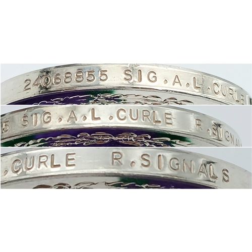 94 - A General Service Medal 1962 with clasp Dhofar, named to: 24068855 Sig A L Curle R Signals.
The clas... 