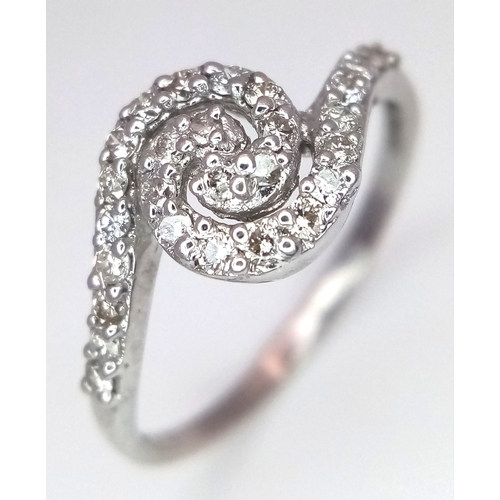 96 - AN 18K WHITE GOLD DIAMOND SET SPIRAL RING - 0.25CTW. 2.2G. SIZE M. SC6062.