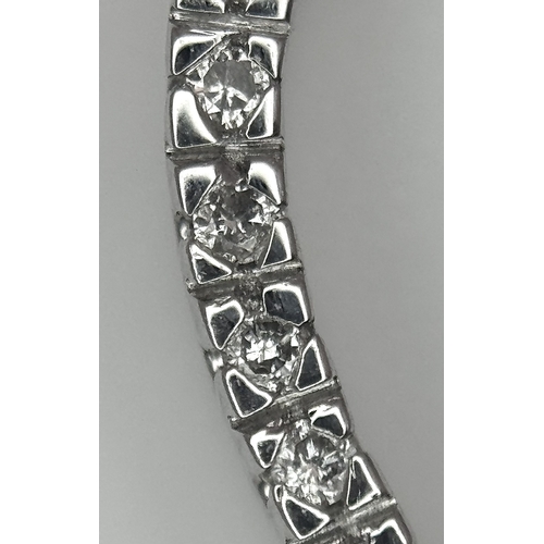 68 - AN 18K WHITE GOLD DIAMOND SET HEART PENDANT. 0.25CTW. 3.3G. SC6058.