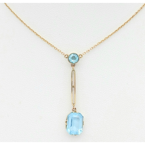 84 - Delightful 9 CARAT GOLD NECKLACE with integrated BLUE TOPAZ DROP PENDANT. 3.25 Grams. 44 cm includin... 