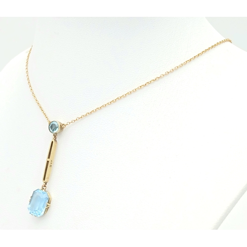 84 - Delightful 9 CARAT GOLD NECKLACE with integrated BLUE TOPAZ DROP PENDANT. 3.25 Grams. 44 cm includin... 