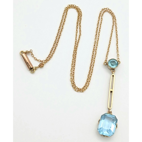 84 - Delightful 9 CARAT GOLD NECKLACE with integrated BLUE TOPAZ DROP PENDANT. 3.25 Grams. 44 cm includin... 