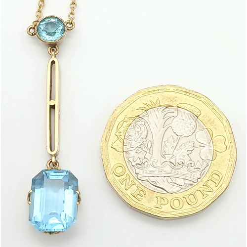 84 - Delightful 9 CARAT GOLD NECKLACE with integrated BLUE TOPAZ DROP PENDANT. 3.25 Grams. 44 cm includin... 