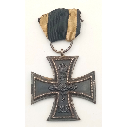 299 - WW1 Imperial German Iron Cross 2nd Class. The medal is a 3-part construction with an iron core. The ... 