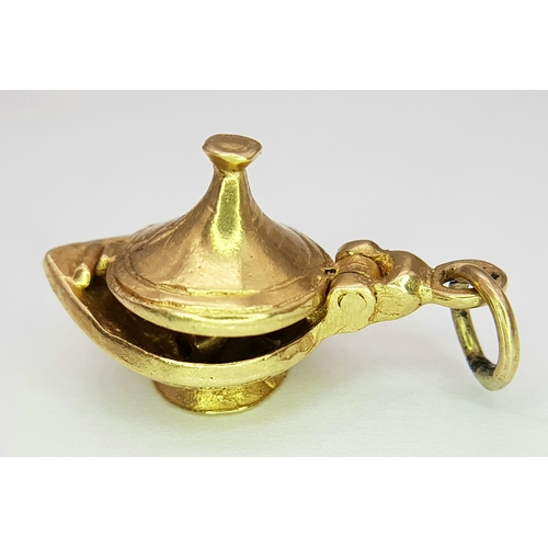 1145 - A 9k yellow gold Genie's magic lamp opening charm/pendant.  5.4g. SH2362I