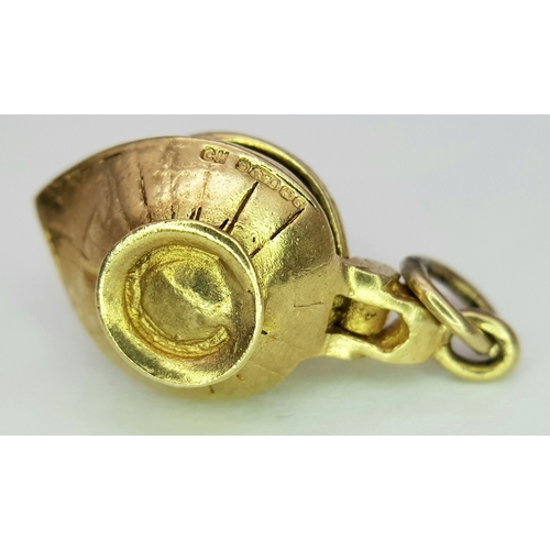 1145 - A 9k yellow gold Genie's magic lamp opening charm/pendant.  5.4g. SH2362I