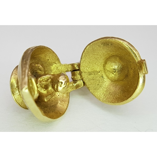 1145 - A 9k yellow gold Genie's magic lamp opening charm/pendant.  5.4g. SH2362I