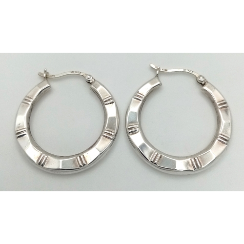 1272 - A pair of 925 silver fashion hoop earrings. Total weight 3.1G.
