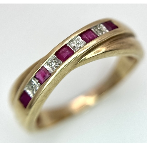 43 - A 9K Yellow Gold Ruby and Diamond Crossover Ring. Size R. 2.83g.