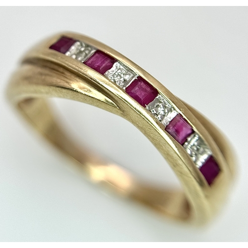 43 - A 9K Yellow Gold Ruby and Diamond Crossover Ring. Size R. 2.83g.