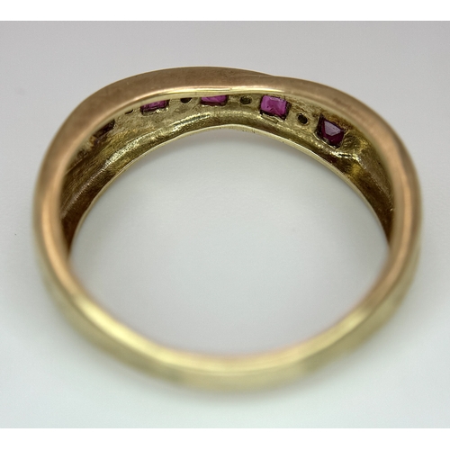 43 - A 9K Yellow Gold Ruby and Diamond Crossover Ring. Size R. 2.83g.