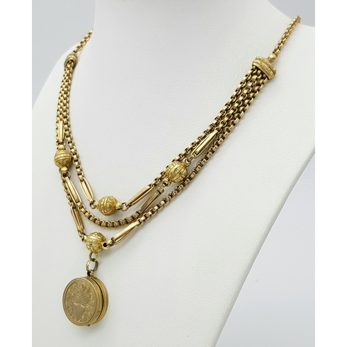 45 - An Antique 9K Gold Albertina Watch Chain with Coin Locket Fob. 42cm. 26.05g.