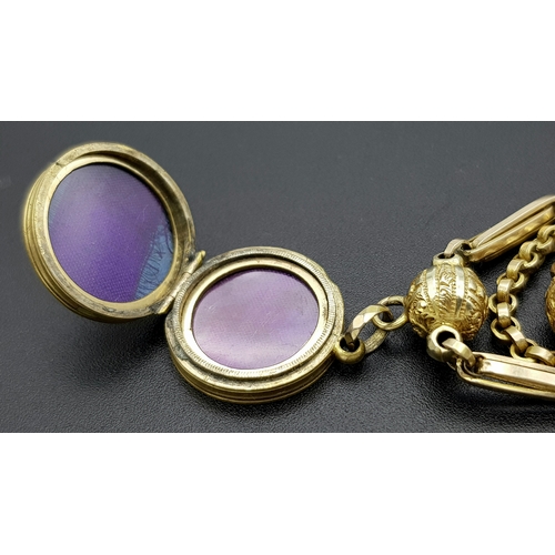 45 - An Antique 9K Gold Albertina Watch Chain with Coin Locket Fob. 42cm. 26.05g.