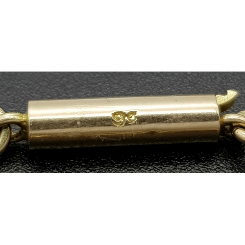 45 - An Antique 9K Gold Albertina Watch Chain with Coin Locket Fob. 42cm. 26.05g.