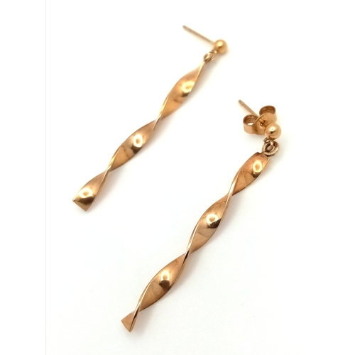 454 - A Pair of 9K Yellow Gold Twist Drop Earrings. 3.5cm. 1.85g.