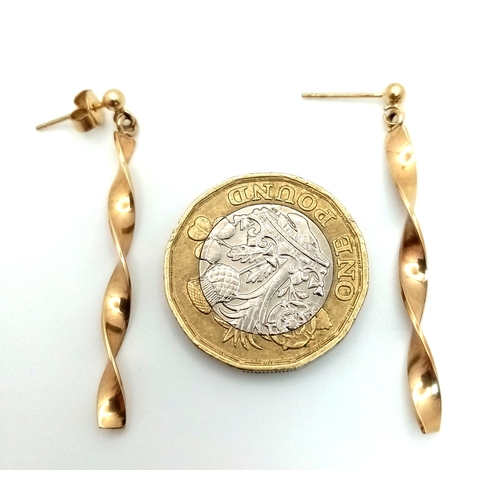 454 - A Pair of 9K Yellow Gold Twist Drop Earrings. 3.5cm. 1.85g.