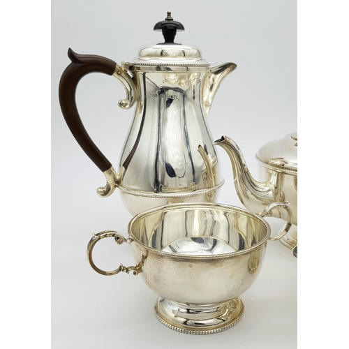 551 - A Vintage Henry Clifford Davis 1958 Sterling Silver Tea and Coffee Set. Teapot, coffee pot, creamer ... 