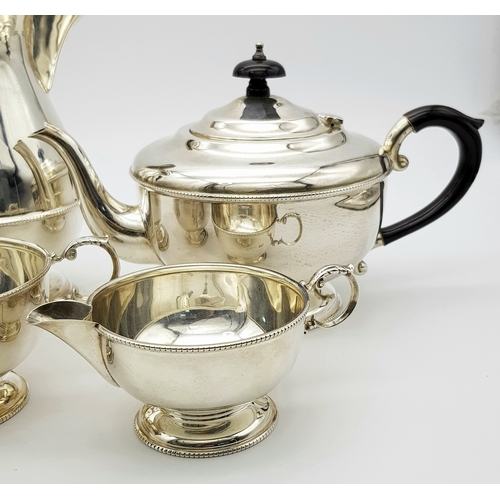 551 - A Vintage Henry Clifford Davis 1958 Sterling Silver Tea and Coffee Set. Teapot, coffee pot, creamer ... 