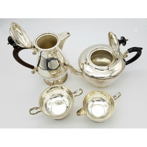 551 - A Vintage Henry Clifford Davis 1958 Sterling Silver Tea and Coffee Set. Teapot, coffee pot, creamer ... 