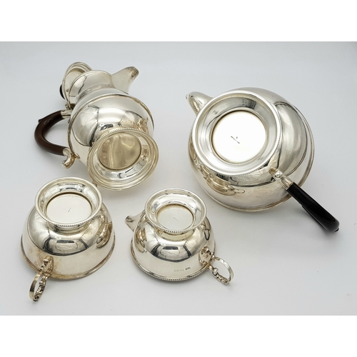 551 - A Vintage Henry Clifford Davis 1958 Sterling Silver Tea and Coffee Set. Teapot, coffee pot, creamer ... 