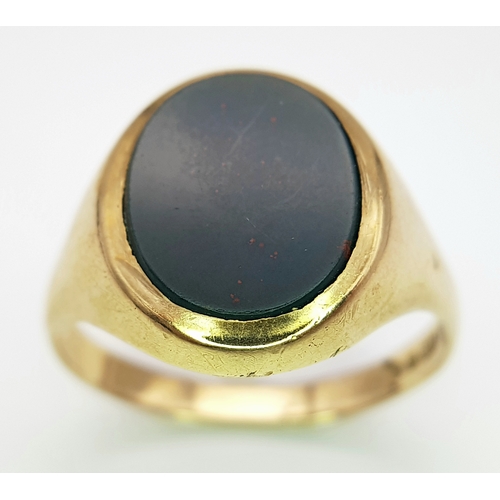6 - A Vintage 9K Yellow Gold Bloodstone Signet Ring. Size U 1/2. 
4.8g.