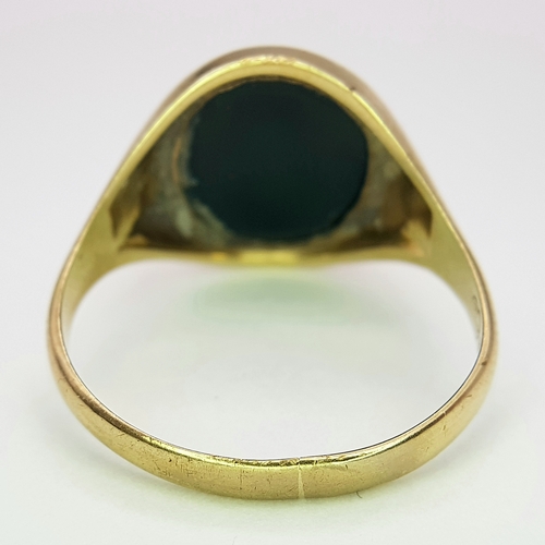 6 - A Vintage 9K Yellow Gold Bloodstone Signet Ring. Size U 1/2. 
4.8g.