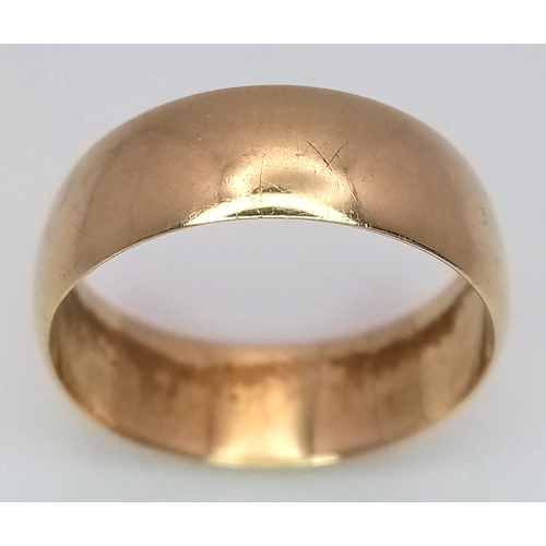60 - An 18K Yellow Gold Band Ring. UK hallmarks. 7mm width. size N. 4.05g.