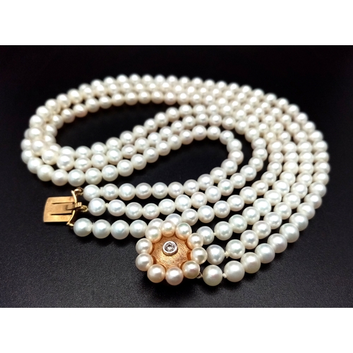 736 - A Three Row White Pearl Choker Necklace with 9K Gold and Diamond Clasp. Pearls 5/6mm. 30-34cm. Ref: ... 
