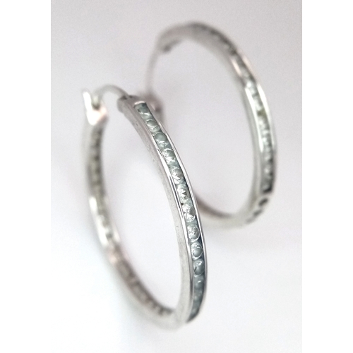 1300 - A stunning pair of 925 silver CZ fashion hoop earrings. Total weight 5.3G.