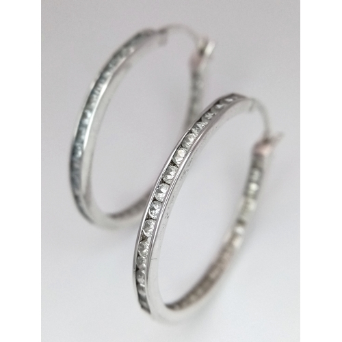 1300 - A stunning pair of 925 silver CZ fashion hoop earrings. Total weight 5.3G.
