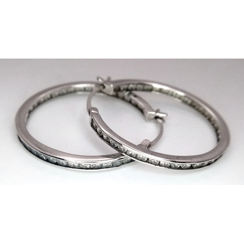 1300 - A stunning pair of 925 silver CZ fashion hoop earrings. Total weight 5.3G.