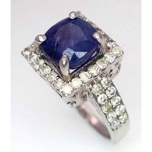 534 - A 3ct Blue Sapphire Ring with 0.7ctw of Diamond Accents. Set in 925 Silver. With case. Comes with a ... 