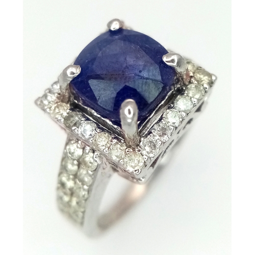 534 - A 3ct Blue Sapphire Ring with 0.7ctw of Diamond Accents. Set in 925 Silver. With case. Comes with a ... 