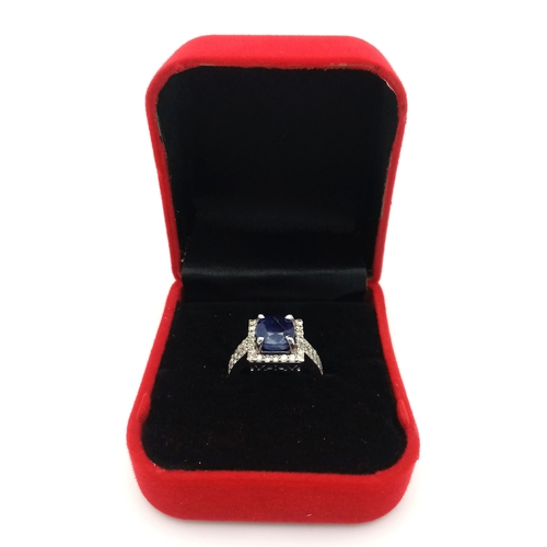 534 - A 3ct Blue Sapphire Ring with 0.7ctw of Diamond Accents. Set in 925 Silver. With case. Comes with a ... 